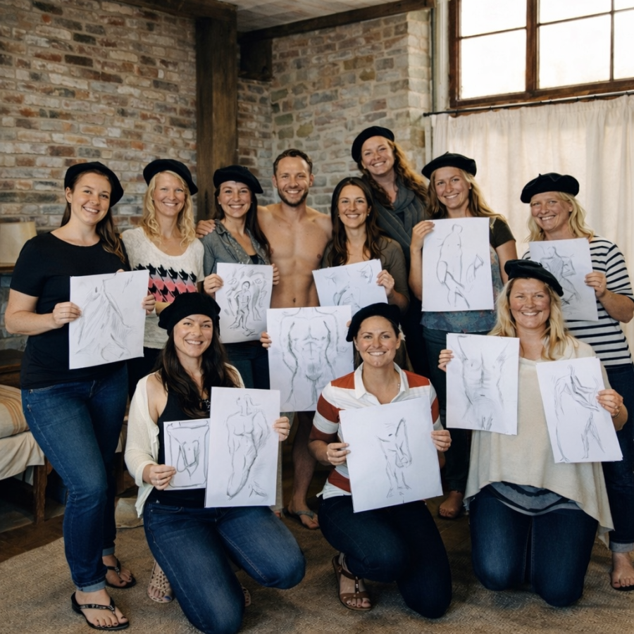 Two friends sketching together, enjoying a relaxed hen party life drawing session.